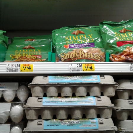 Potatoes in the egg section at the grocery store